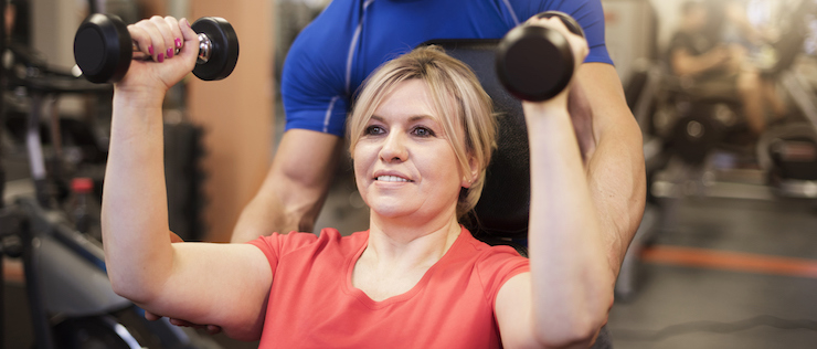 Lady being motivated at the gym following New Years.