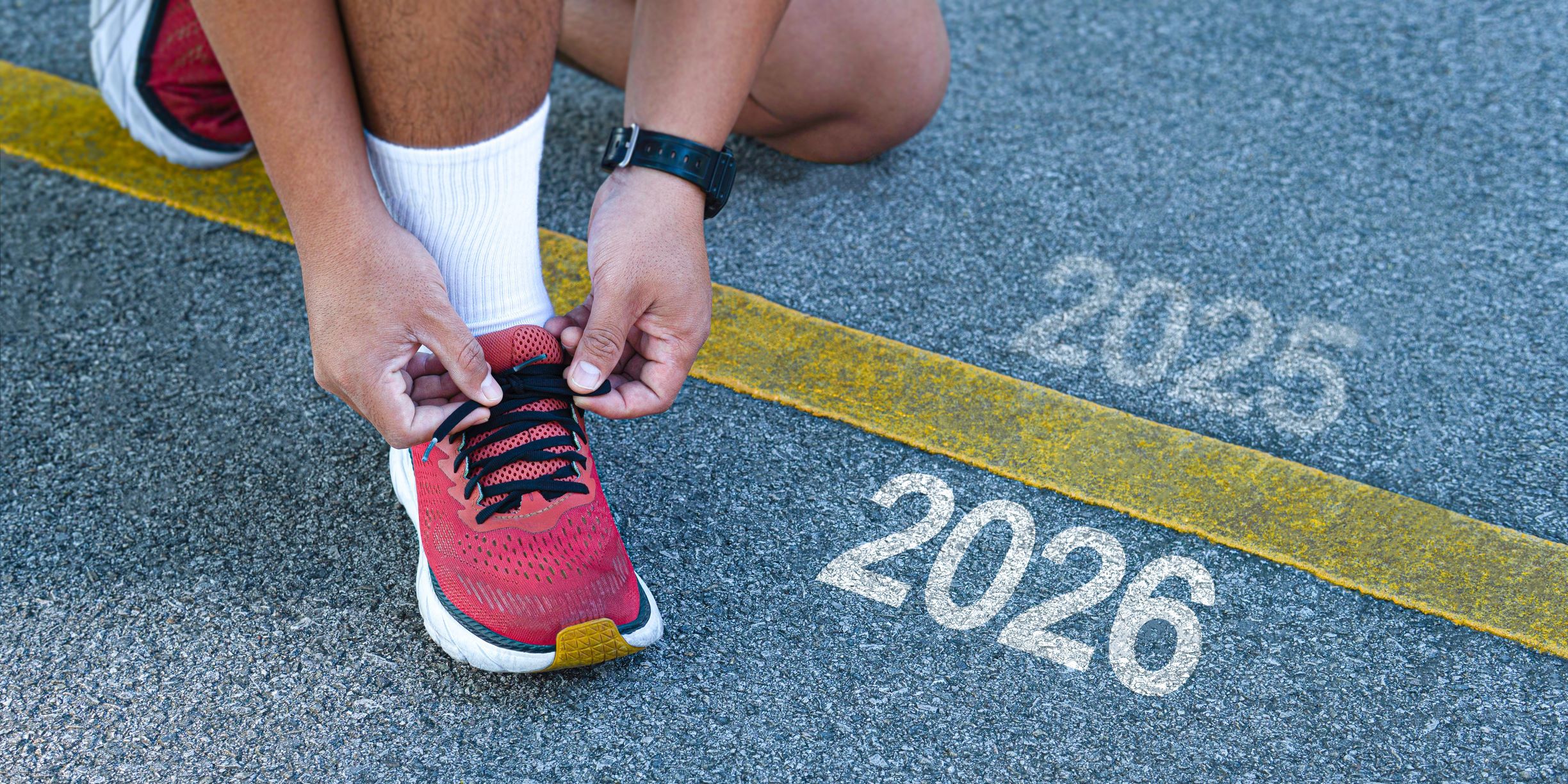 The finish line of the old year 2025 and get ready to start...towards new goals in 2026. New paths await us, whether it be challenges, career paths or changes. stock photo