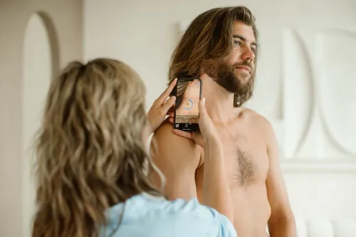 Person getting scanned using SkinVision app