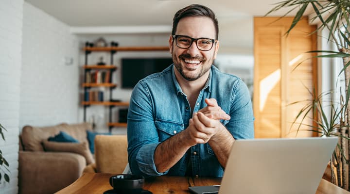 a man happy with HIF health insurance